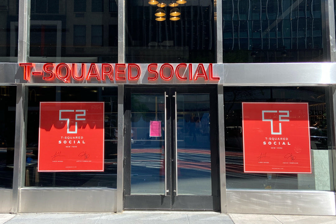 Luxury flagship storefront with floor-to-ceiling large format window graphics 