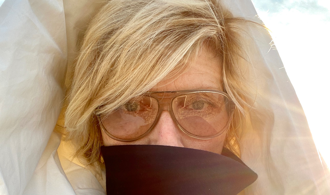 Photo of Gigi Still wearing sunglasses