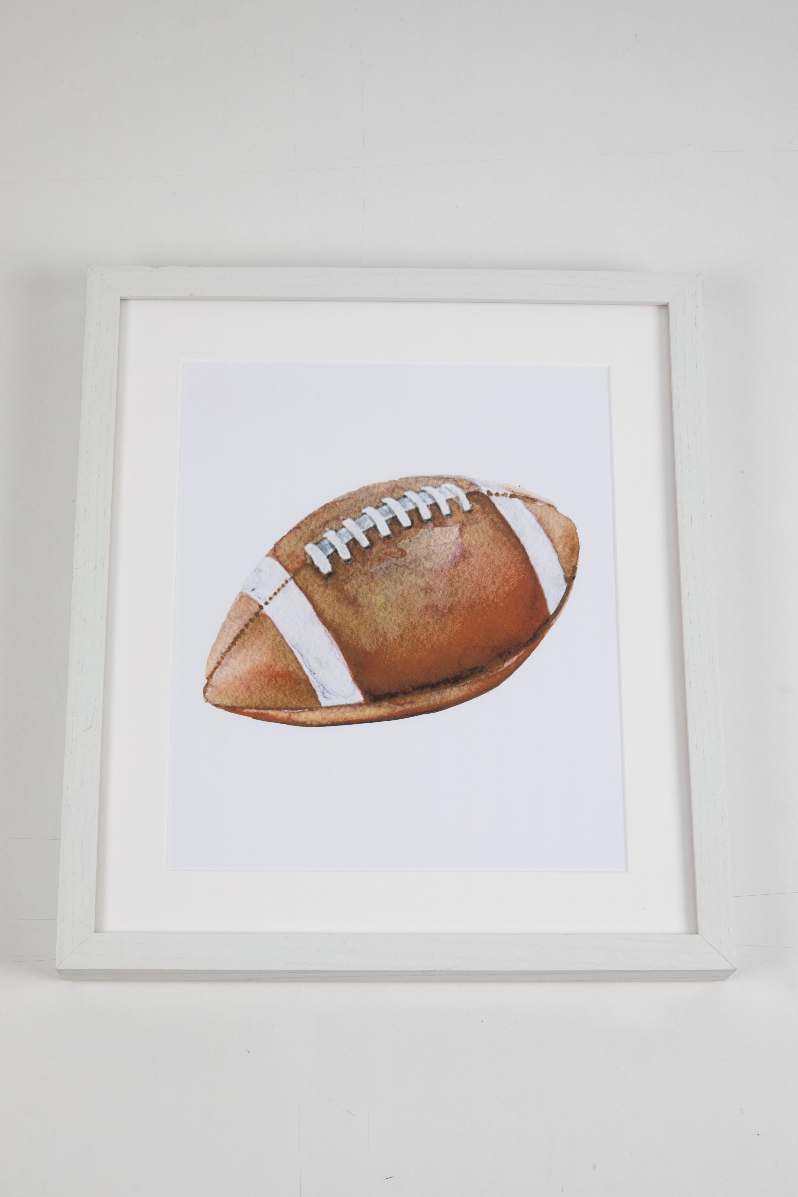 Football Watercolor Art with White Frame