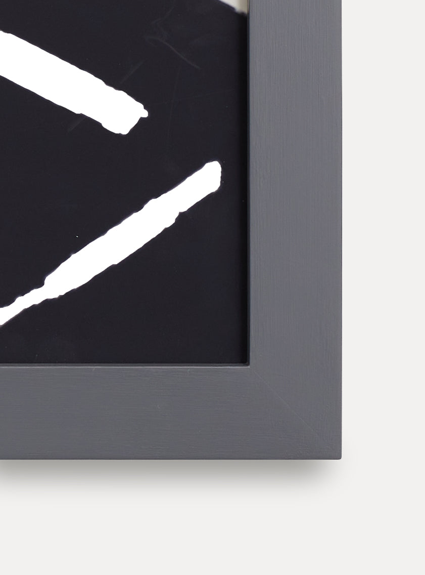 close up of grey frame holding abstract art