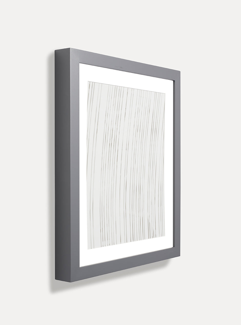 side view grey frame holding abstract art
