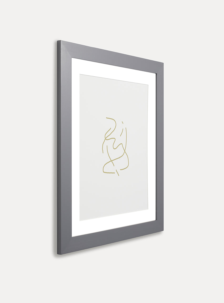 side view of grey frame holding abstract art