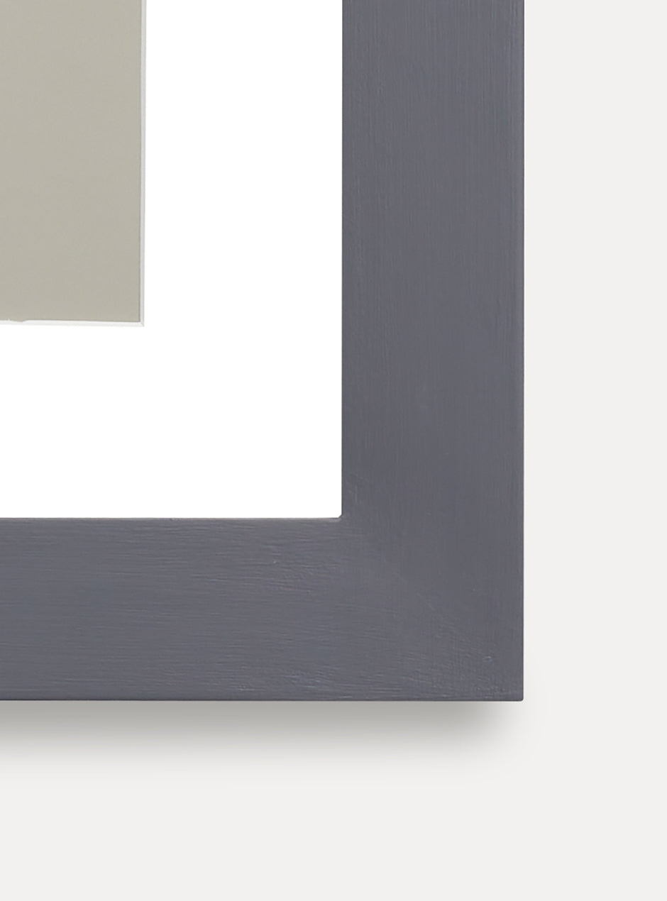close up of corner grey frame holding abstract art