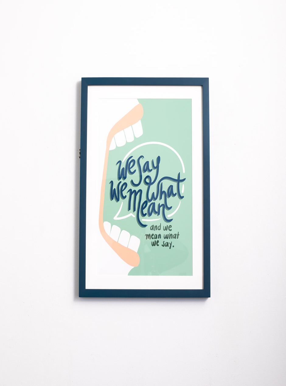 mouth we say what we mean and mean what we say on green background in thin white frame