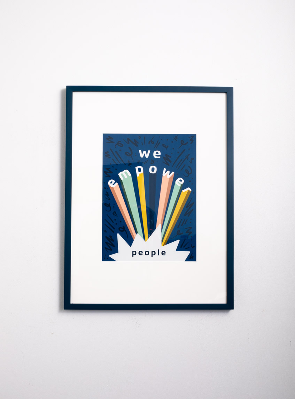 we empower people on blue background colorful in thin navy frame