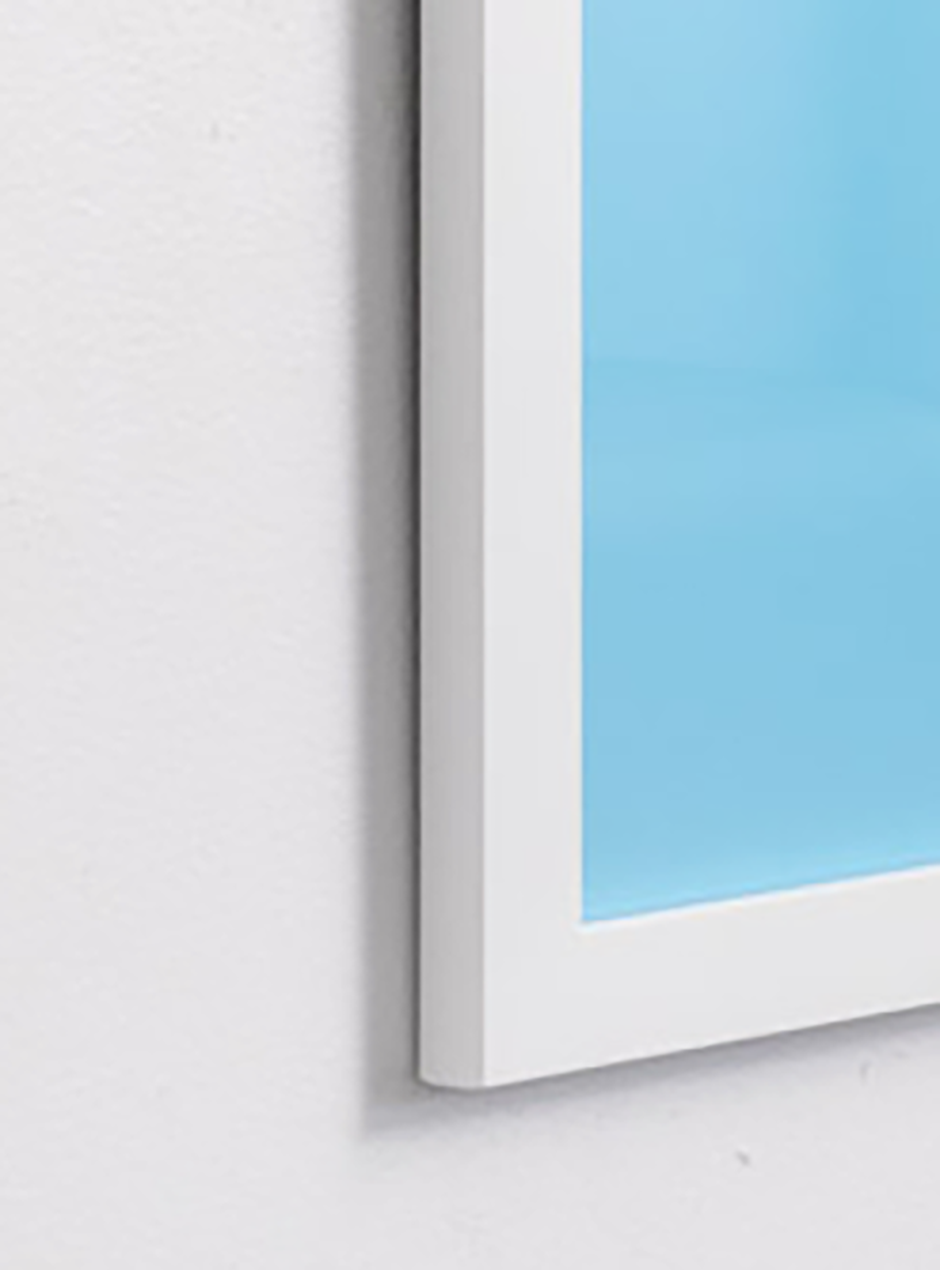 close up light blue we get stuff done! with yellow checked box in thin white frame