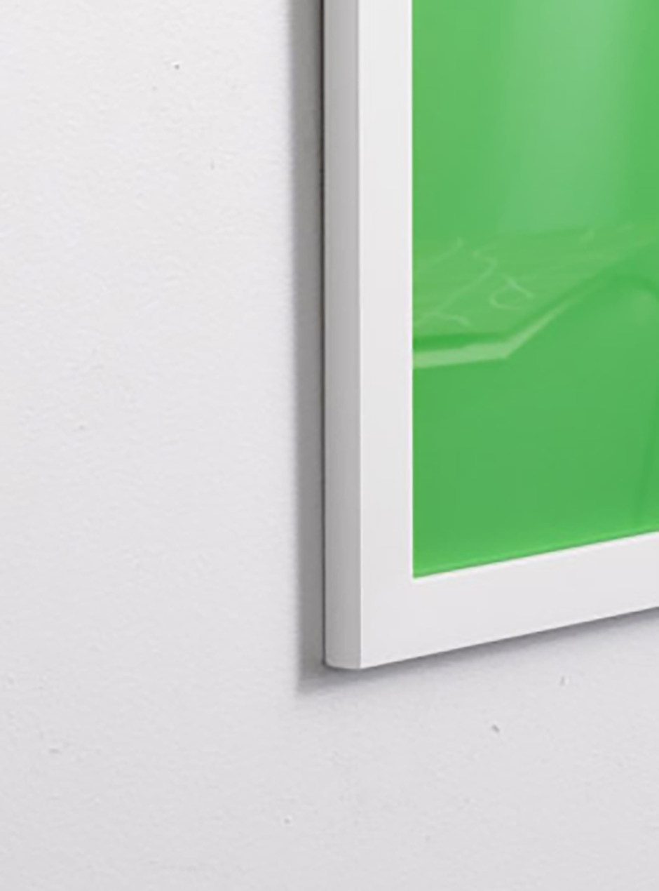 close up we empower people on green background with blue helmet in thin white frame