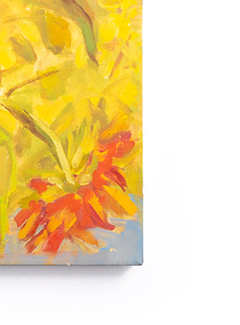 close up of corner of handpainted sunflowers on canvas
