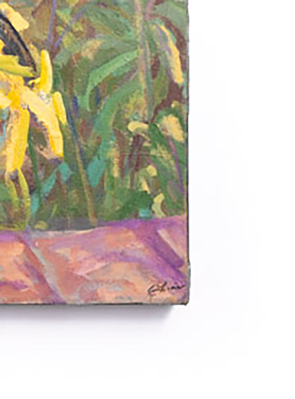 close up of coroner of handpainted sunflowers on canvas