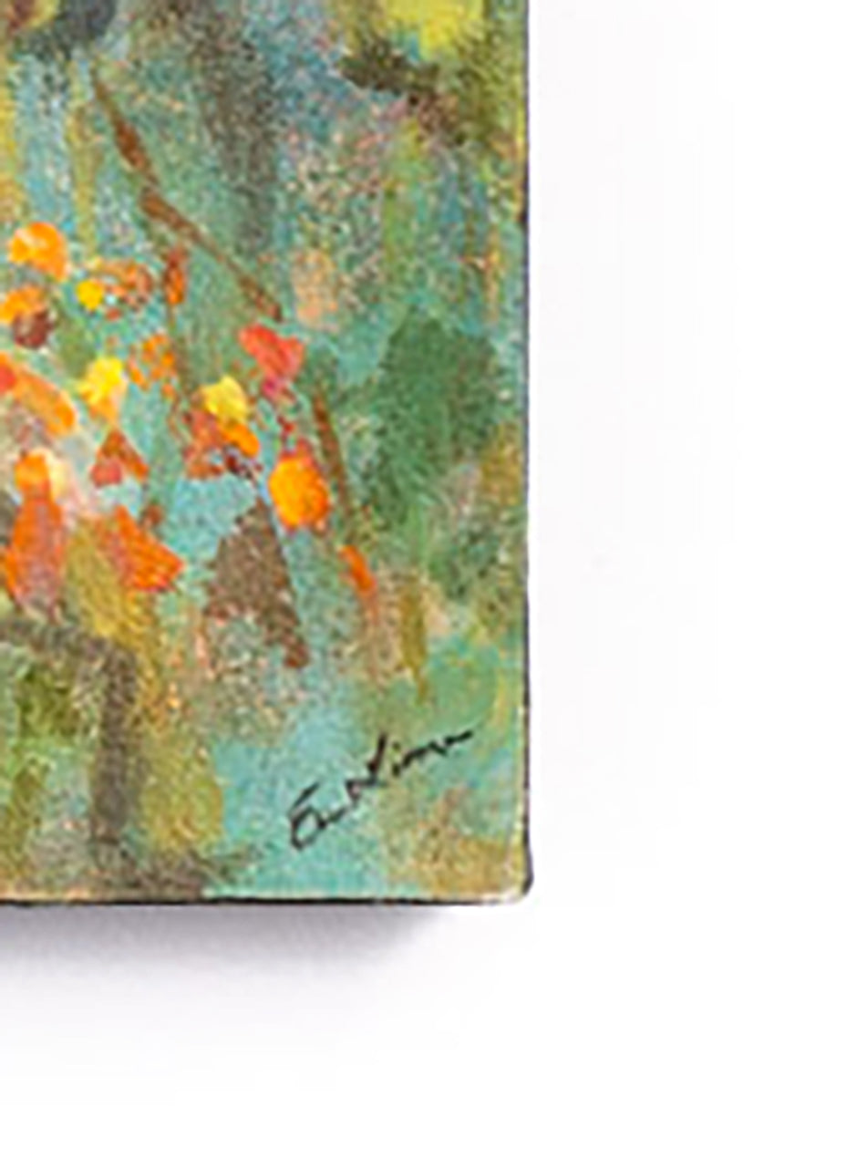 close up of corner of handpainted sunflowers on canvas