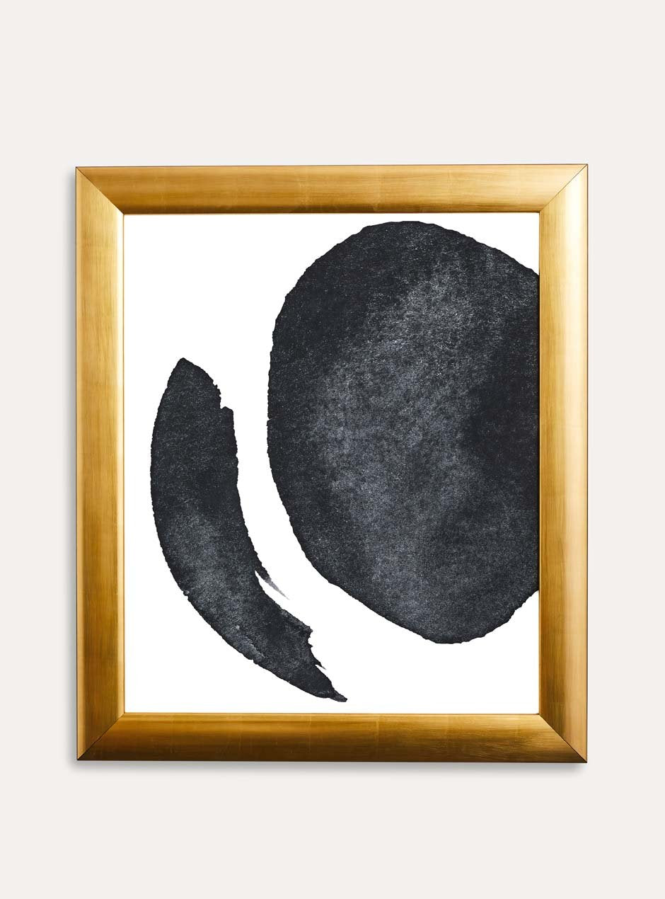 gold frame holding abstract art