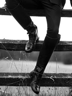 boots on a fence photograph 