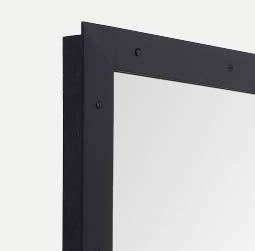 close up of black metal framed mirror