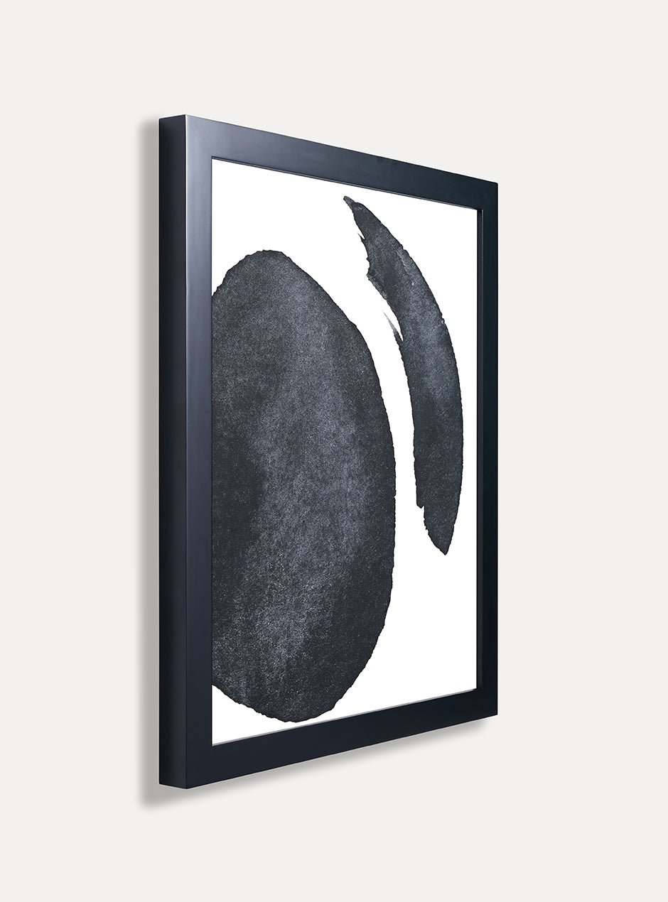 side view of black frame with abstract art 