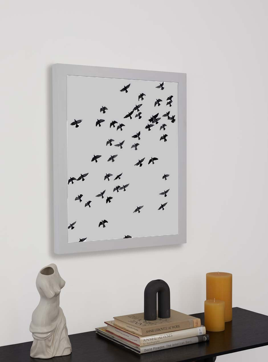 white frame hung in home