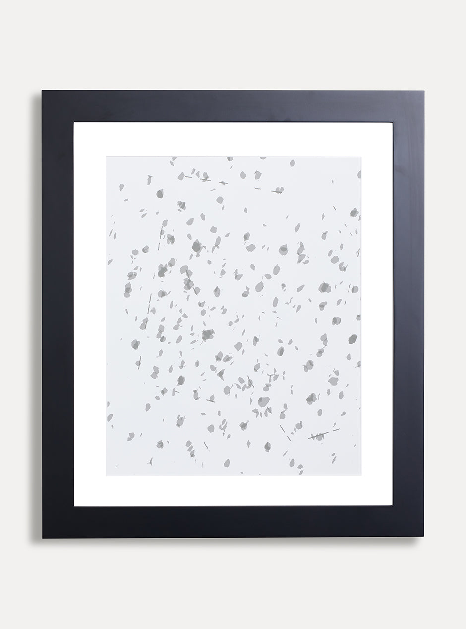 black frame holding abstract art