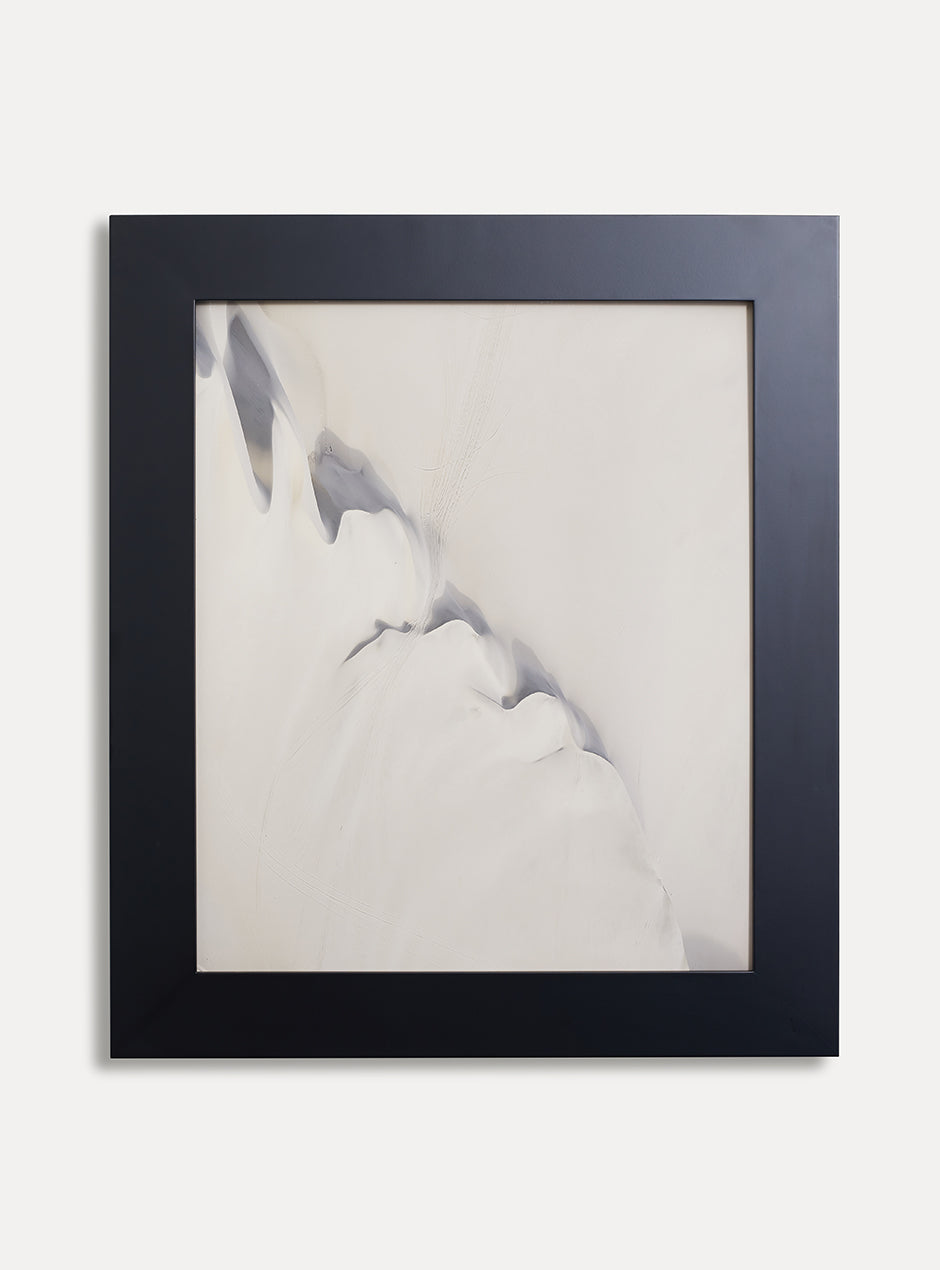 Black frame holding abstract art