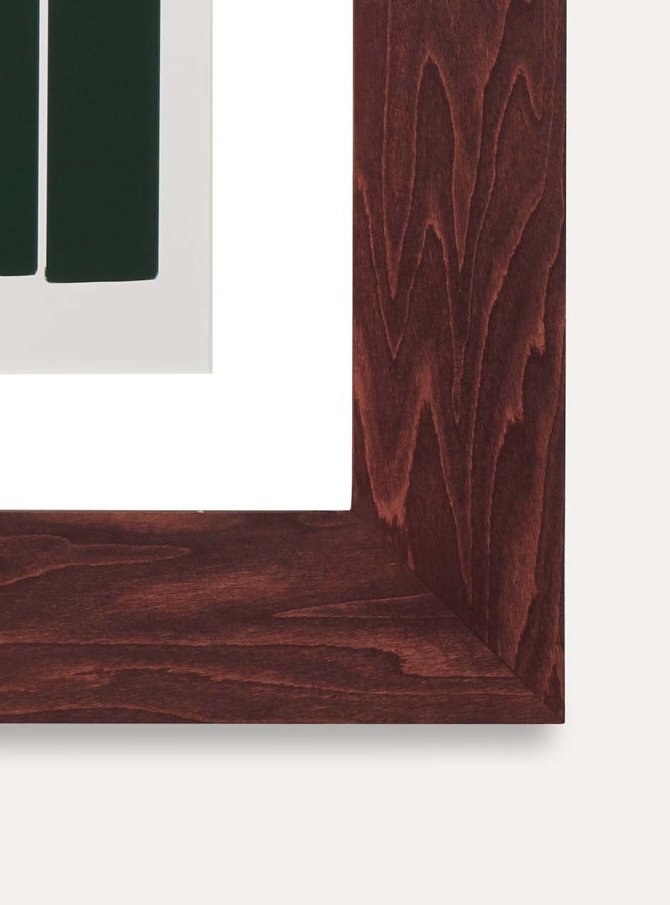 corner view dark stained wooden frame holding abstract painting 