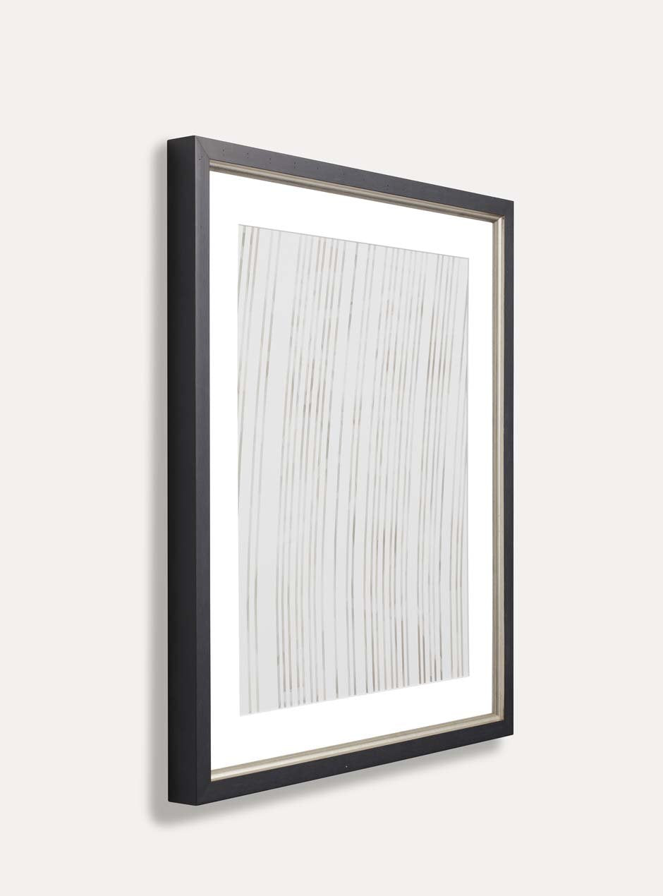 side view of black frame with silver inner detailing 