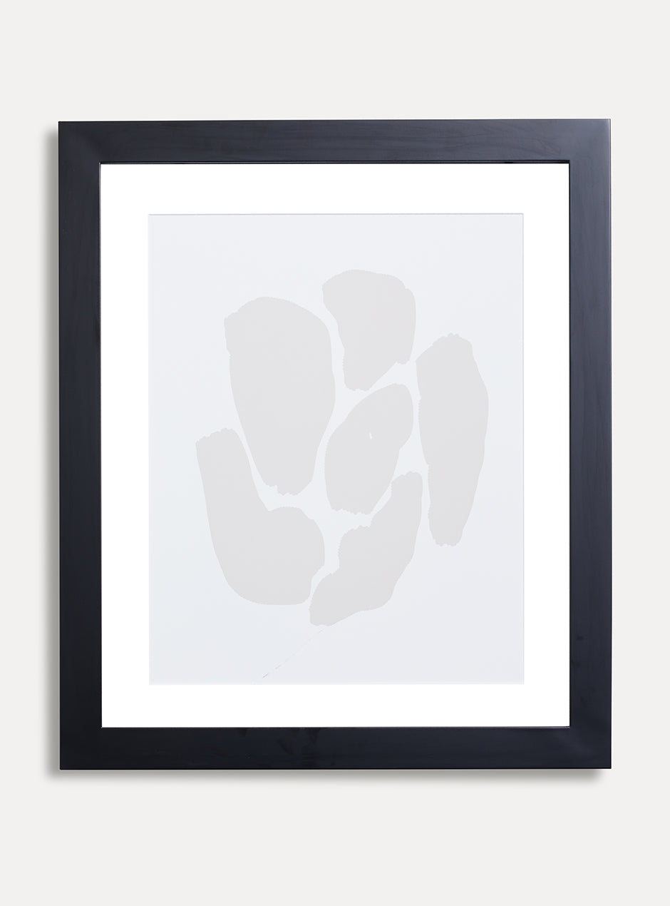 black frame holding abstract art 