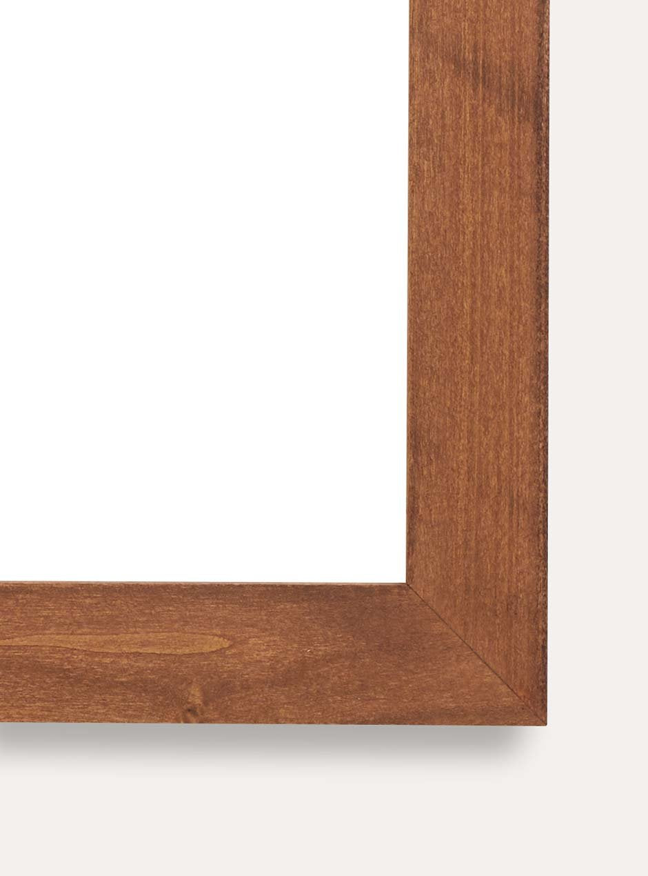Close up of corner of wooden frame holding abstract art
