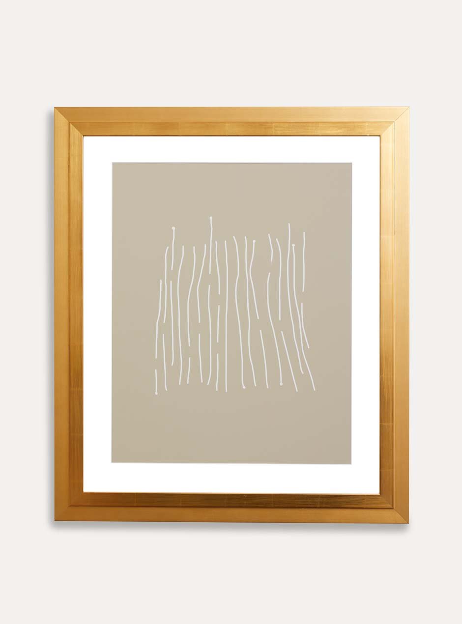 gold frame holding abstract art