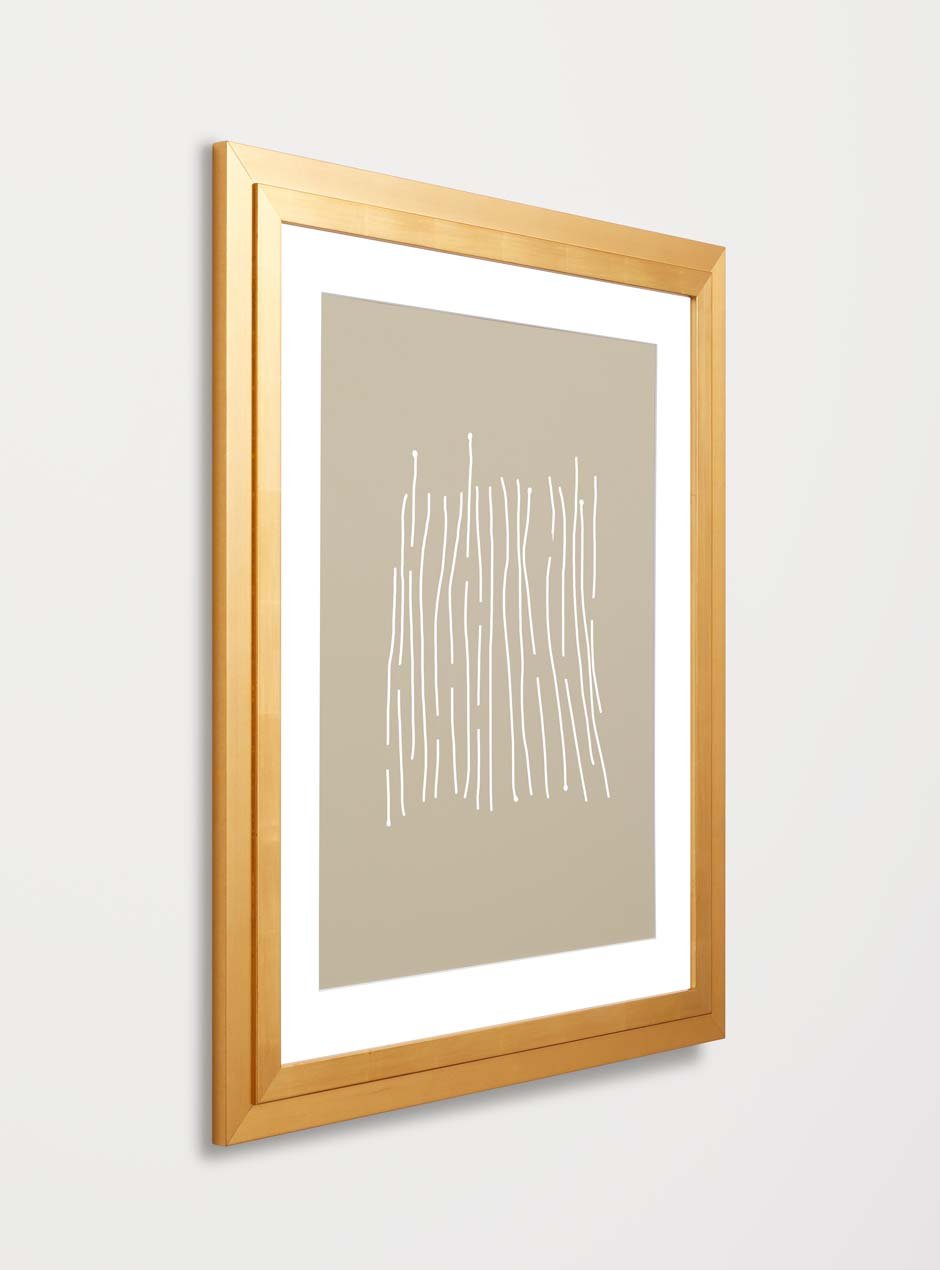 side view gold frame holding abstract art