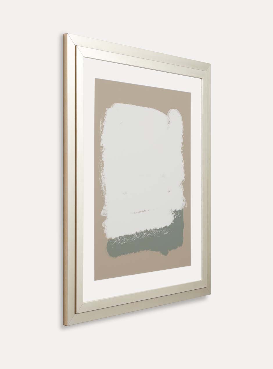 side view silver frame holding abstract art