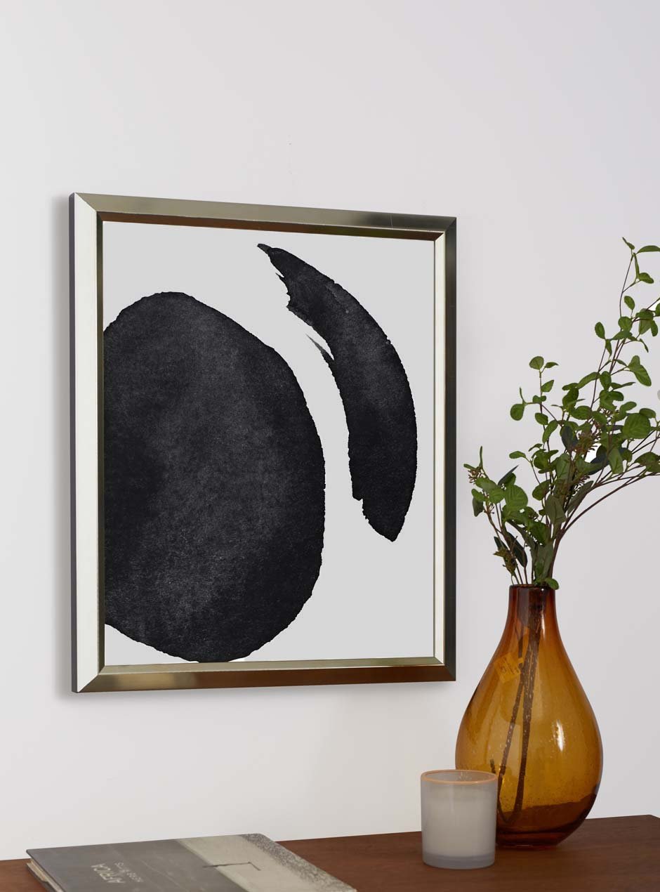 silver frame hung in home