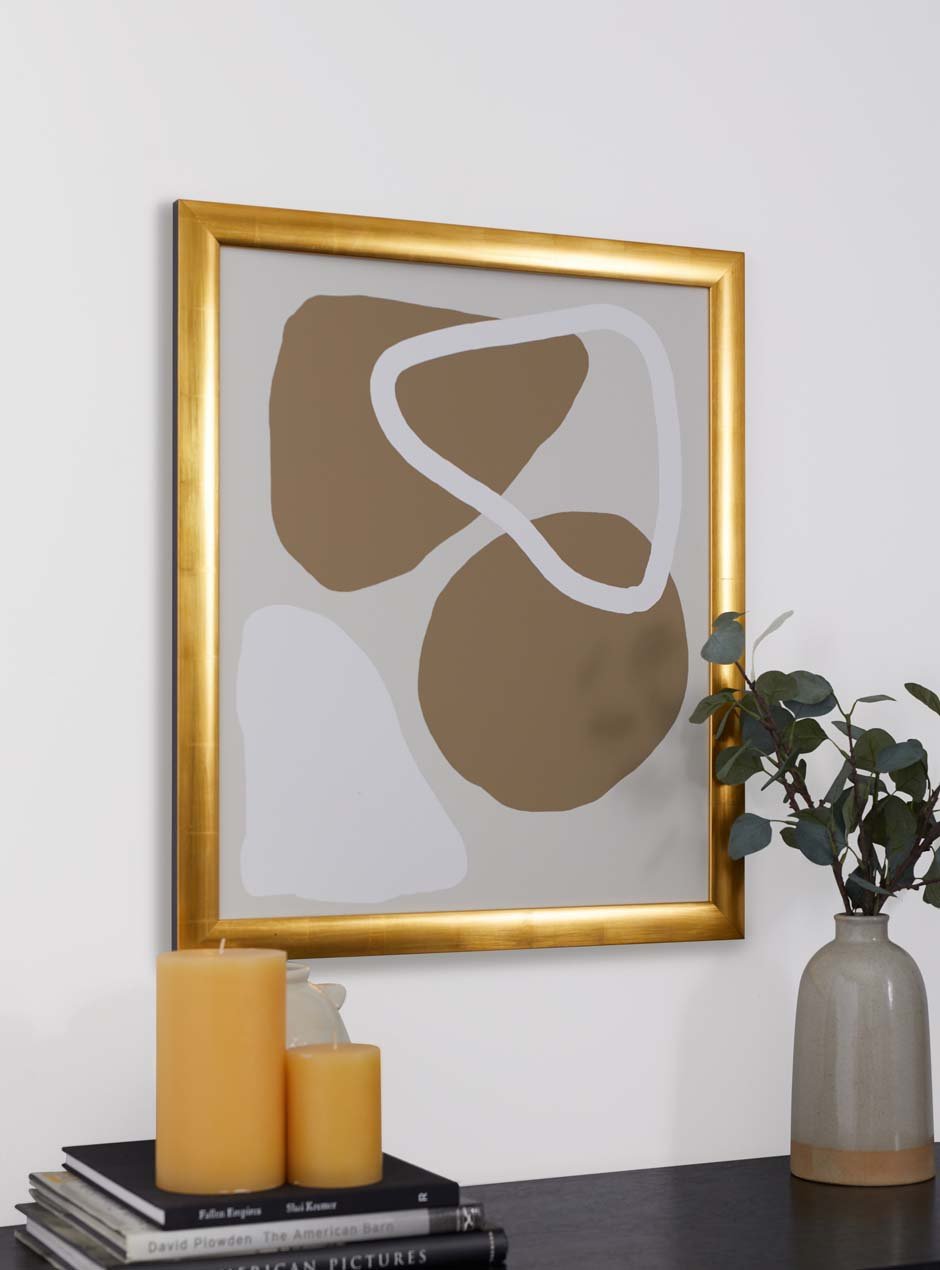 gold frame hung in home