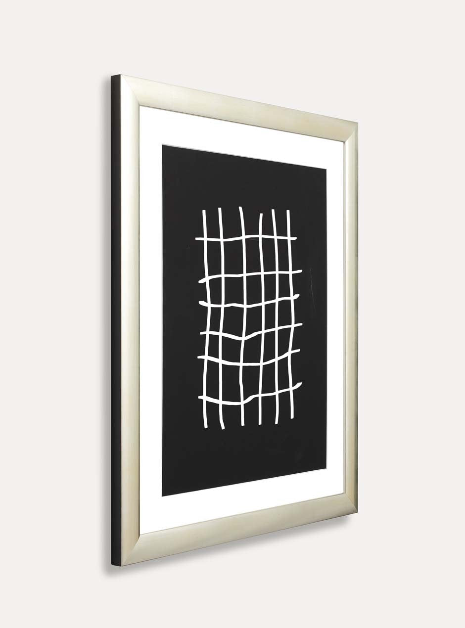 side view silver frame holding abstract art