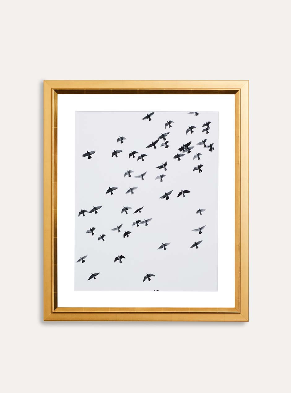 gold frame holding abstract art