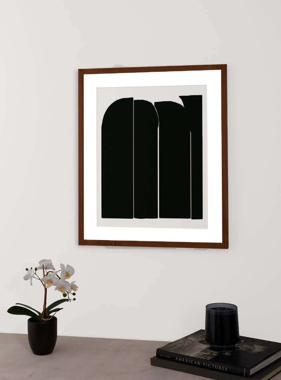 maple slim frame above table with various objects