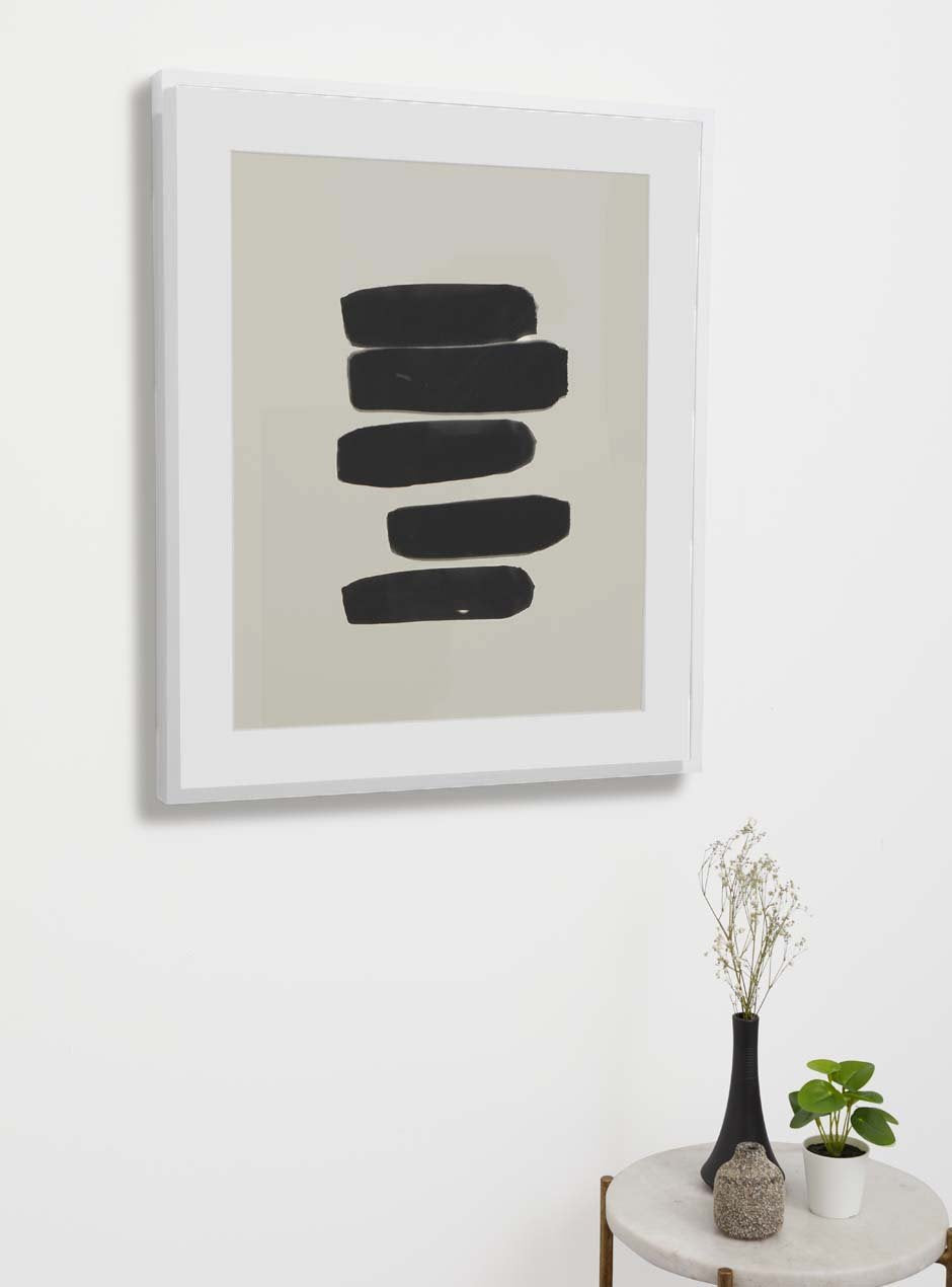 thin white frame hung in home