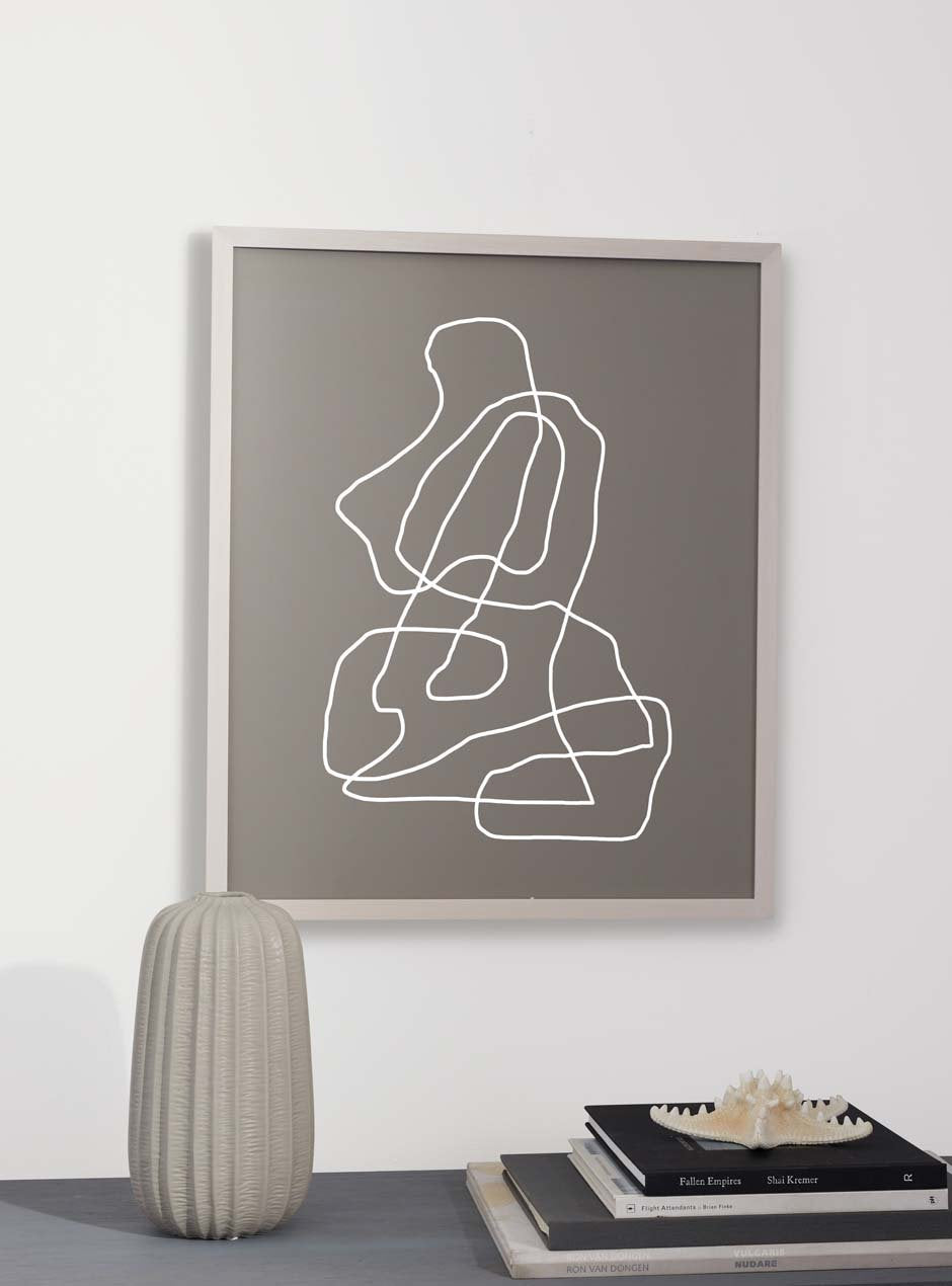 thin white frame hung in home