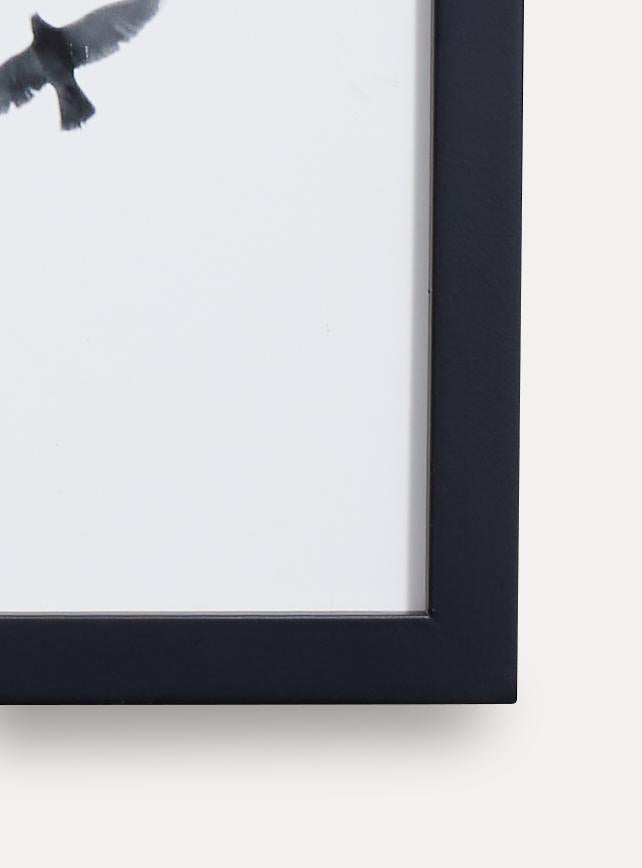 Up close detail photo of wooden frame showing wood grain
