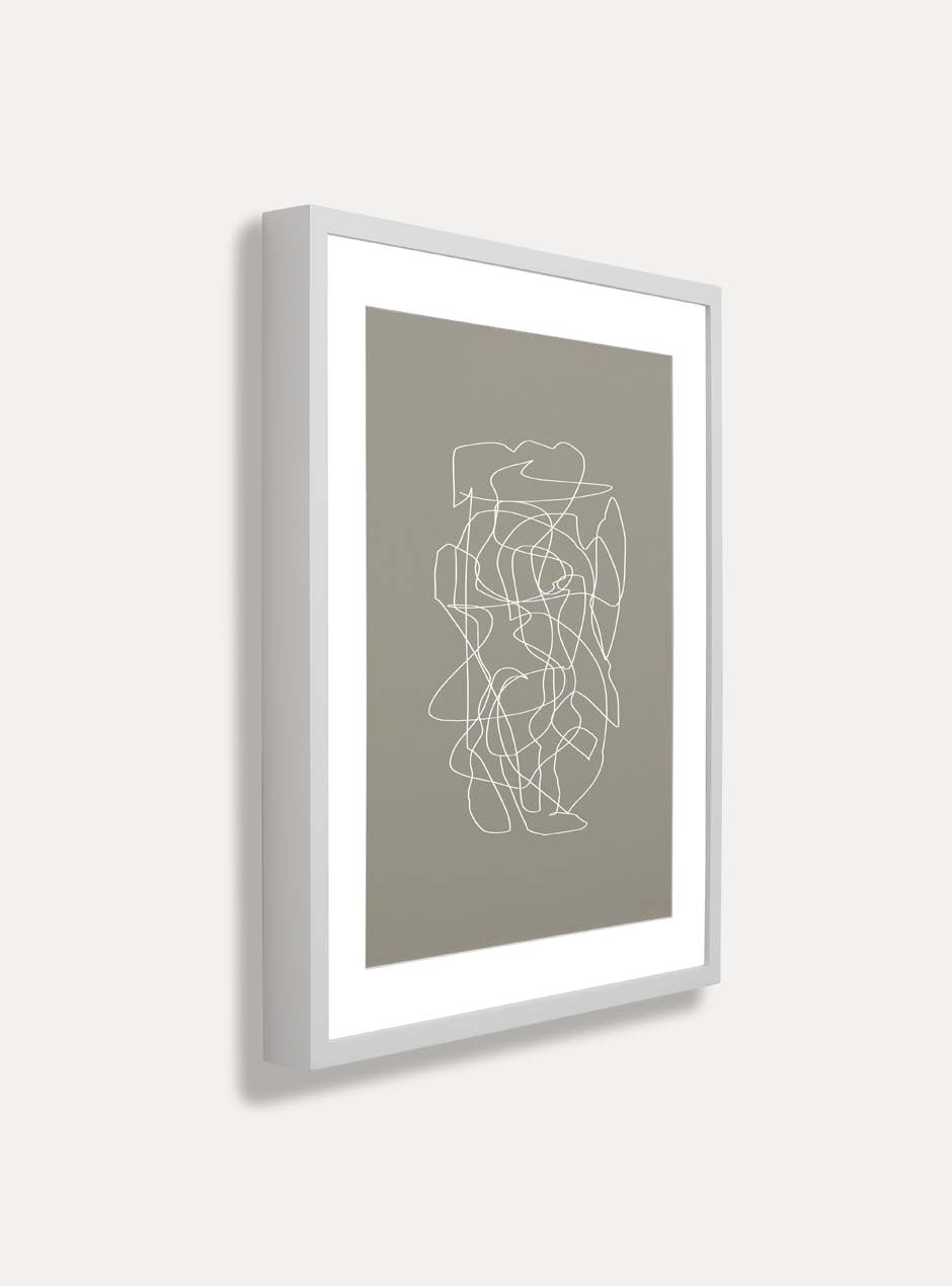 Side view of white frame holding abstract art