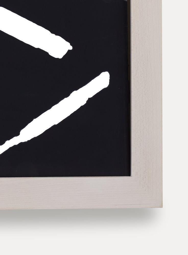 Up close detail photo of wooden frame showing wood grain