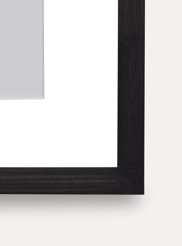 Up close detail photo of wooden frame showing wood grain