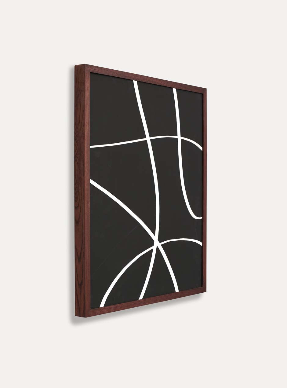 side view dark stained thin wooden frame holding abstract painting 