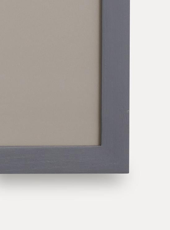 Up close detail photo of wooden frame showing wood grain