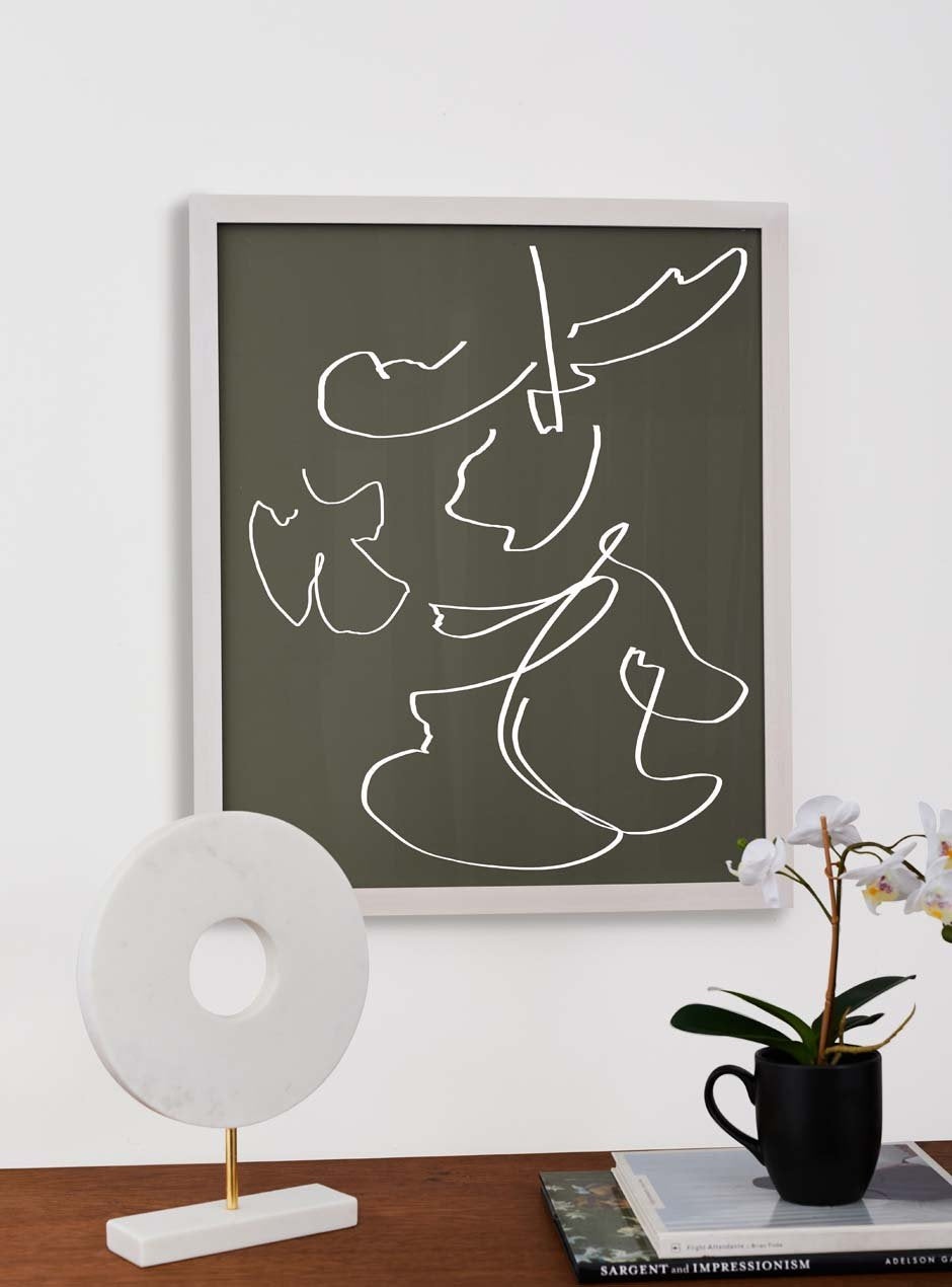thin white frame hung in home
