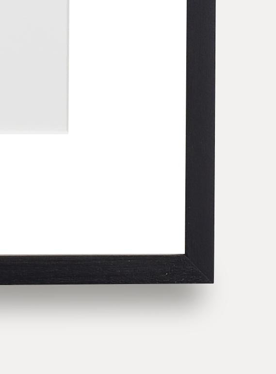 Up close detail photo of wooden frame showing wood grain