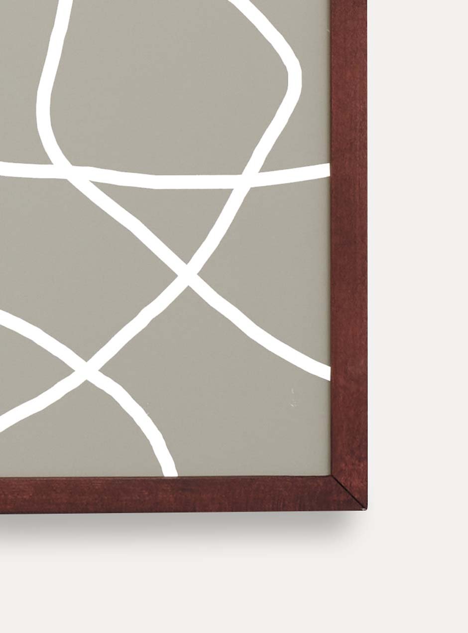 corner view dark stained thin wooden frame holding abstract painting 