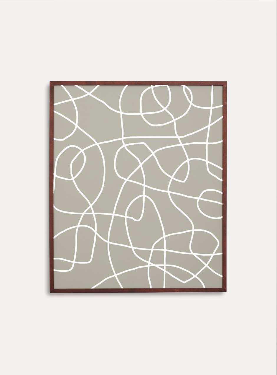 dark stained thin wooden frame holding abstract painting 
