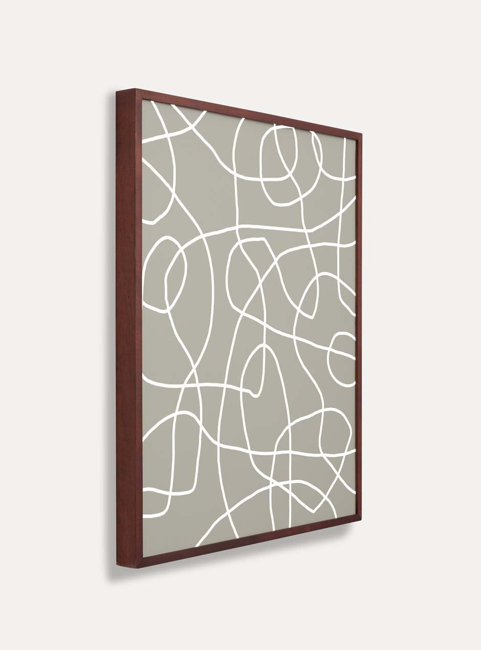 side view dark stained thin wooden frame holding abstract painting 