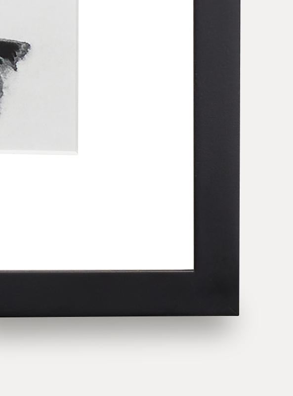 Up close detail photo of wooden frame showing wood grain