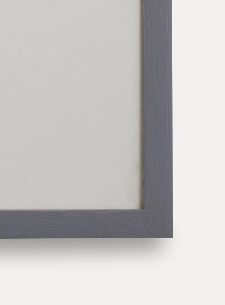 Up close detail photo of wooden frame showing wood grain