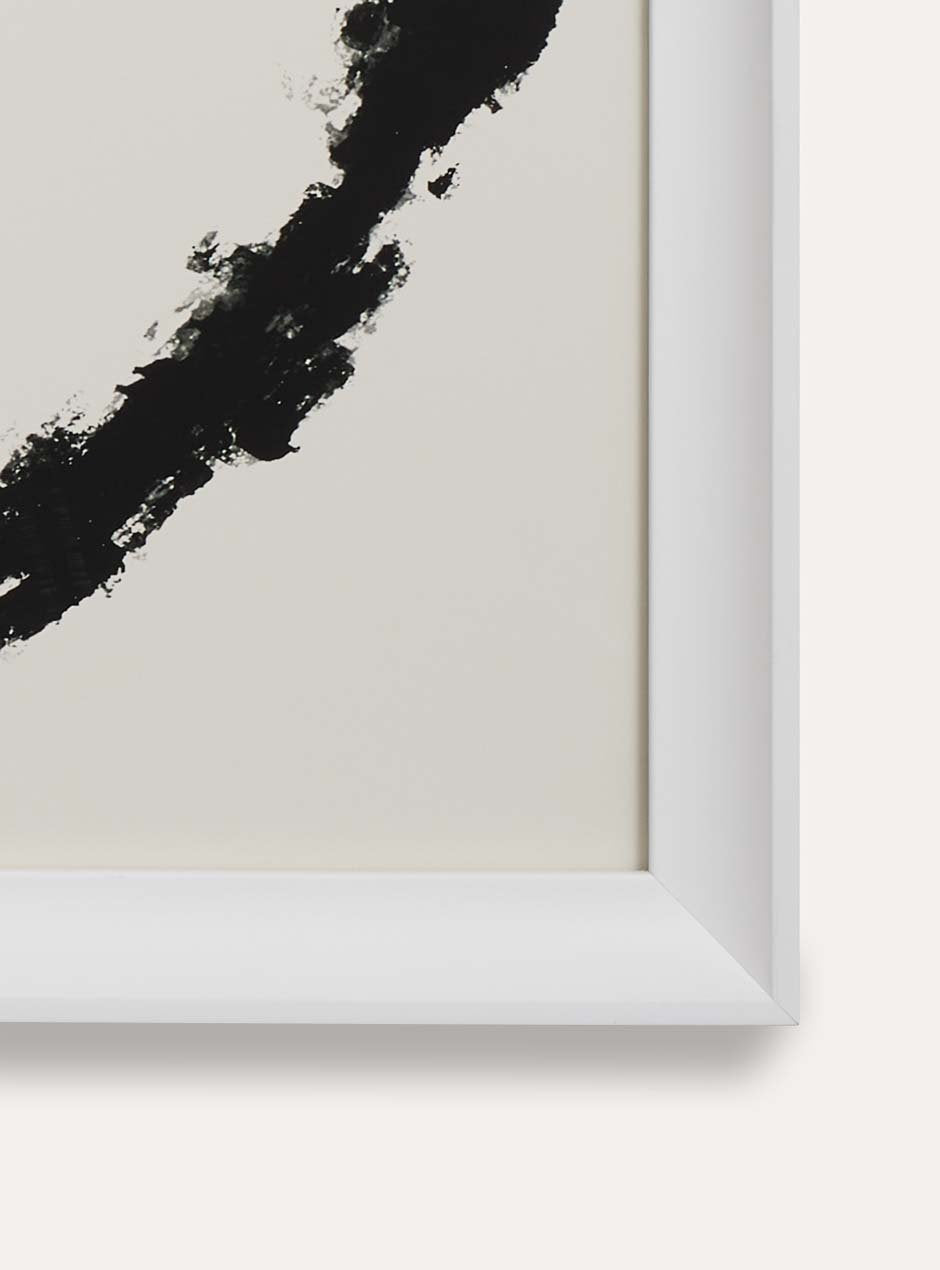 close up of corner of white frame holding abstract art