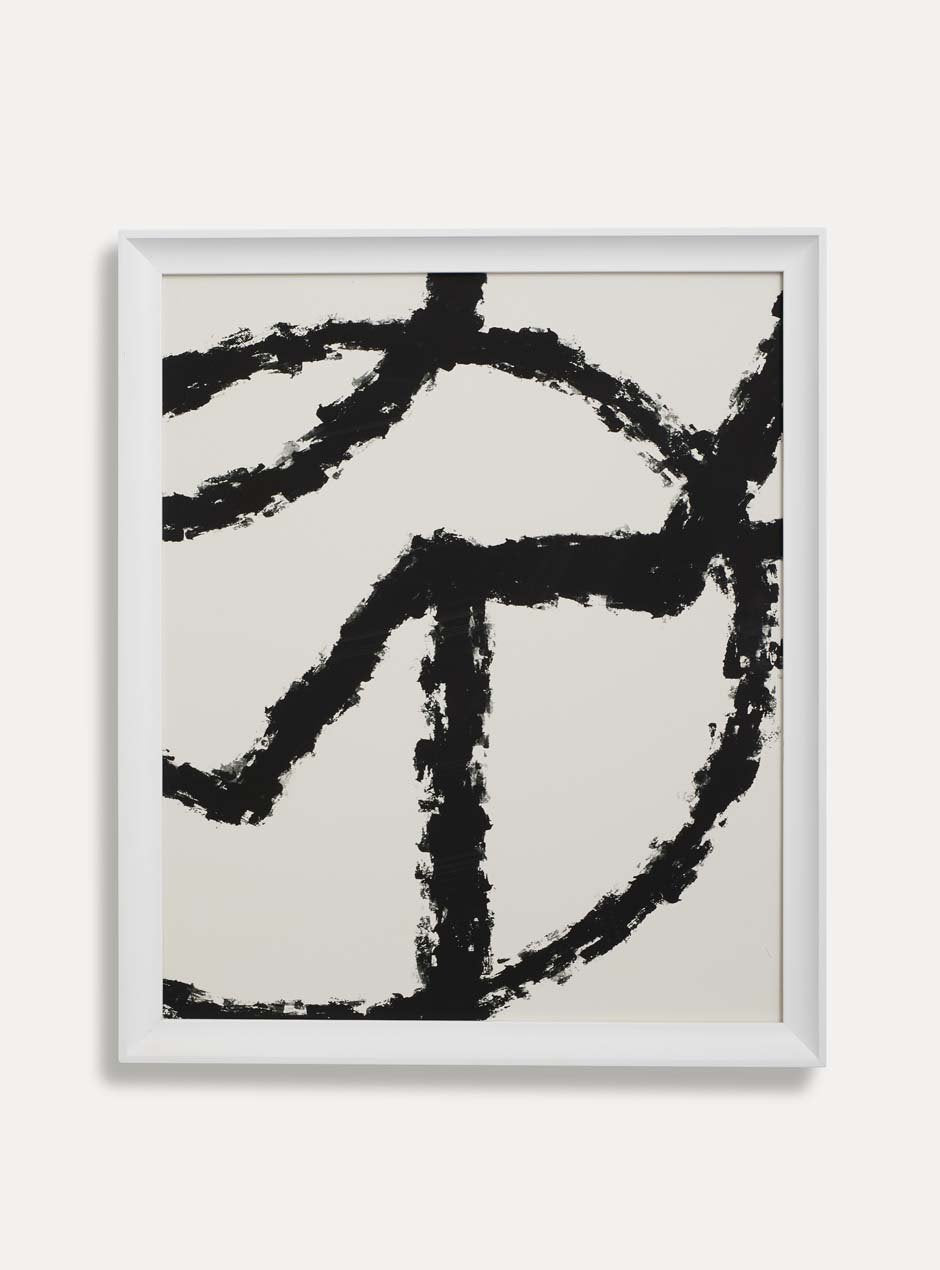 white frame holding abstract art